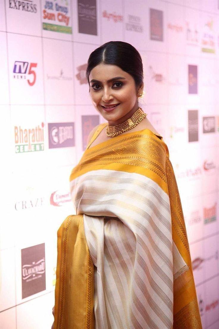 YELLOW AND GOLDEN SOFT SILK DESIGNER SAREE