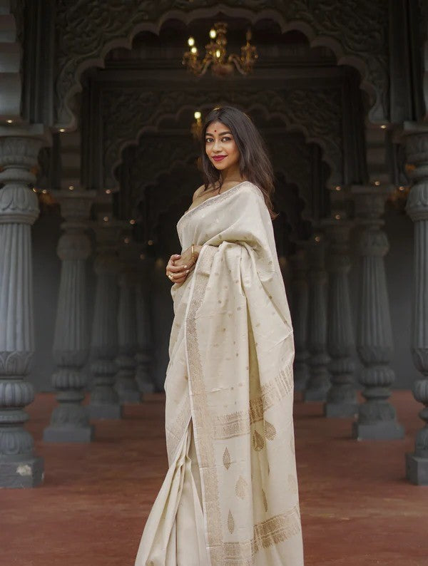 EFFERVESCENT CREAM COLOR SOFT SILK SAREE WITH BLOUSE PIECE