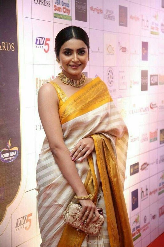 YELLOW AND GOLDEN SOFT SILK DESIGNER SAREE